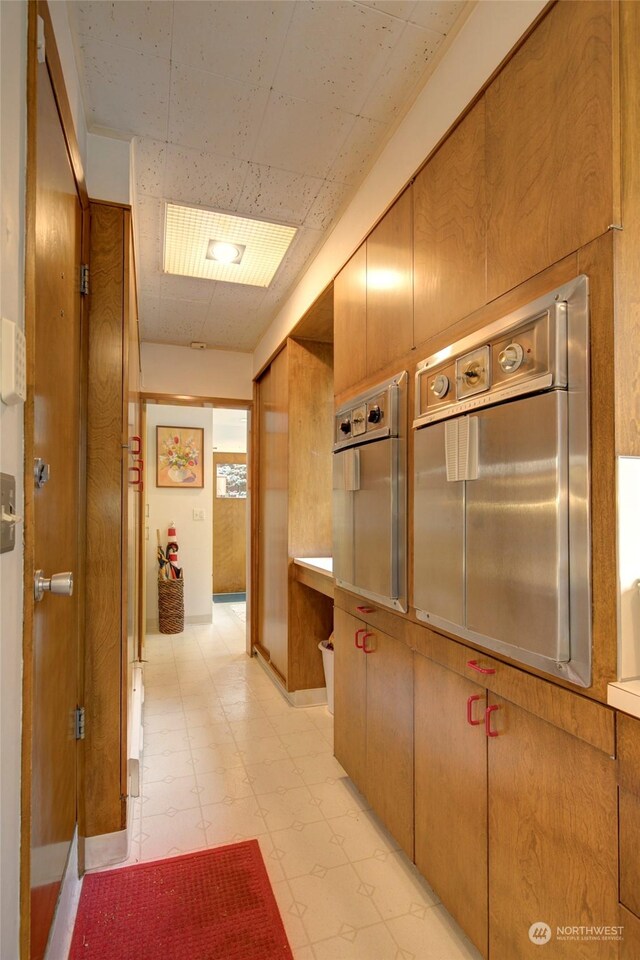 kitchen with oven and wall oven