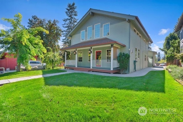 view of front of property with a front yard and covered porch