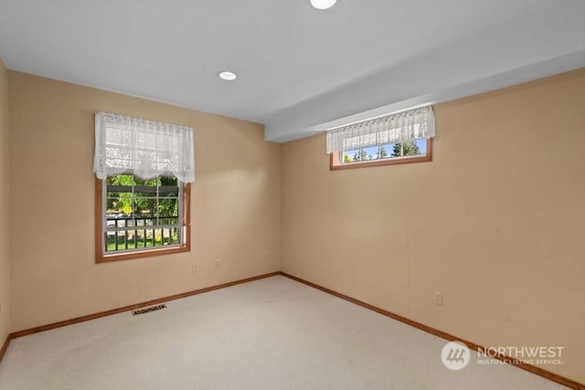 view of carpeted spare room