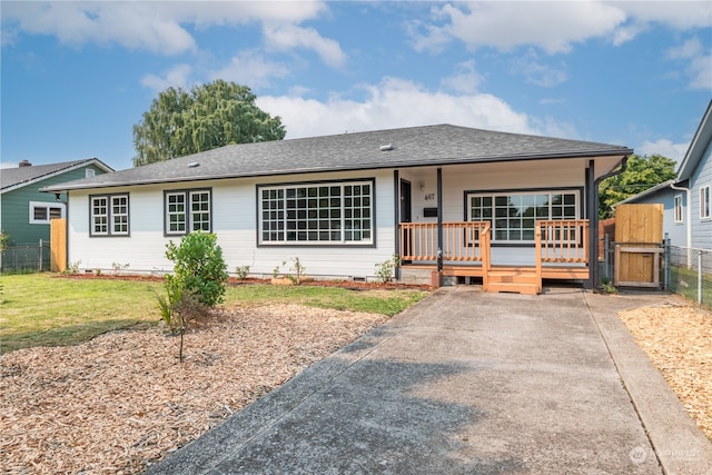 ranch-style home featuring a porch