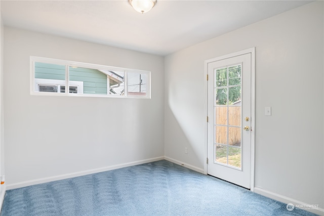 empty room featuring carpet flooring