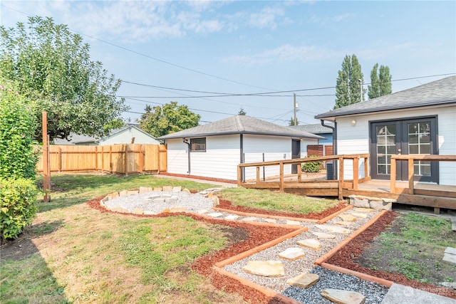 view of yard with a wooden deck