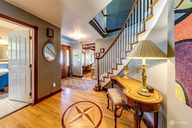 entrance foyer with light hardwood / wood-style flooring