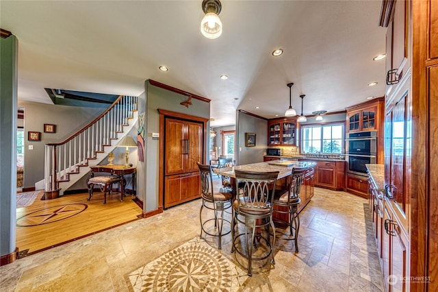 dining space featuring ceiling fan and light hardwood / wood-style floors