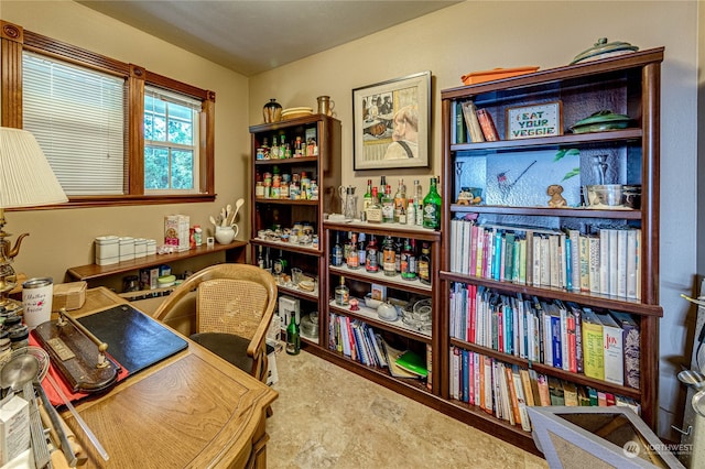 office space featuring concrete flooring