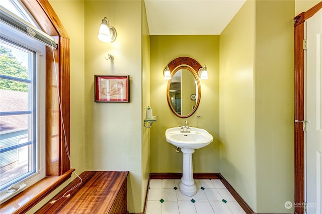 bathroom with tile patterned flooring