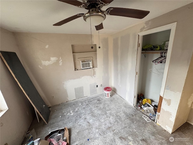 unfurnished bedroom featuring cooling unit, a closet, and ceiling fan