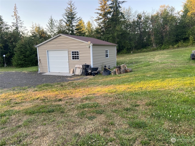 garage with a lawn