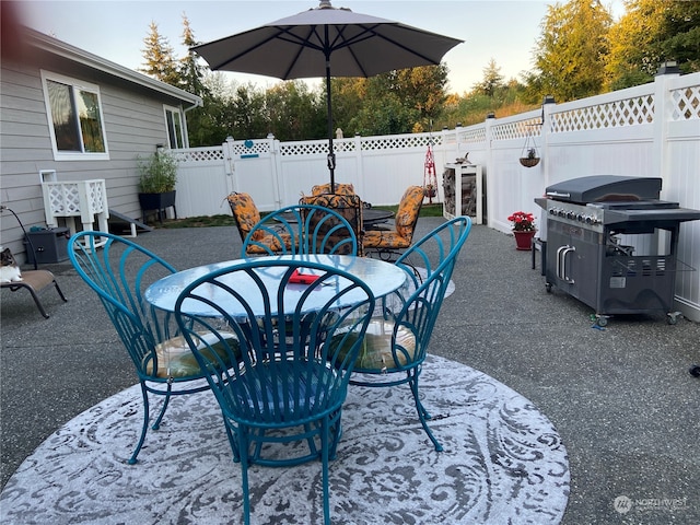 view of patio with a grill