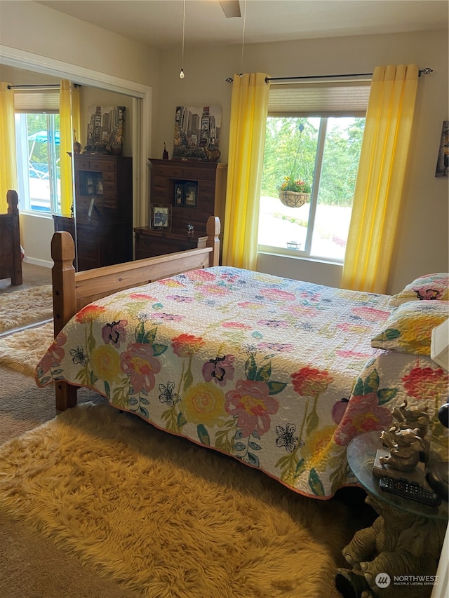 bedroom featuring ceiling fan