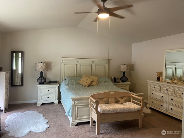 carpeted bedroom featuring lofted ceiling and ceiling fan