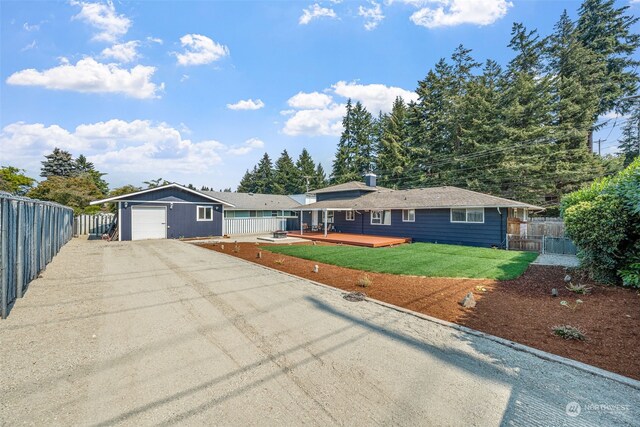 ranch-style home with a front yard