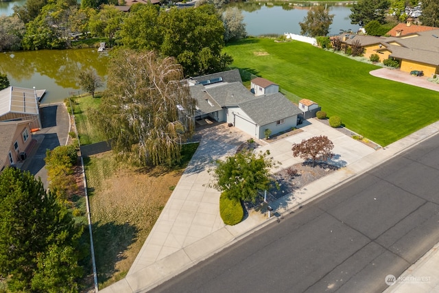 bird's eye view with a water view