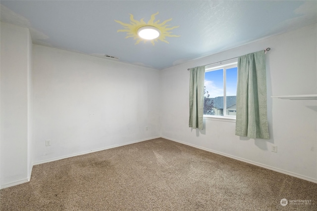 view of carpeted spare room