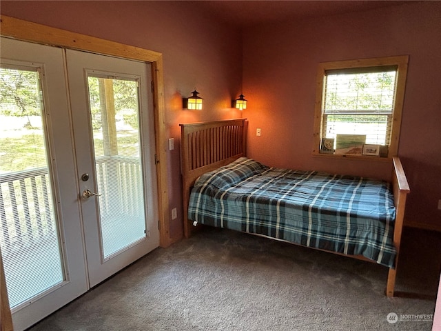 carpeted bedroom featuring access to outside and french doors