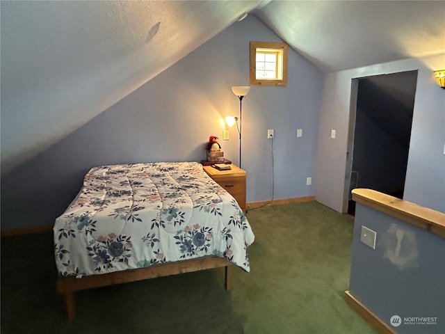 bedroom featuring carpet and lofted ceiling