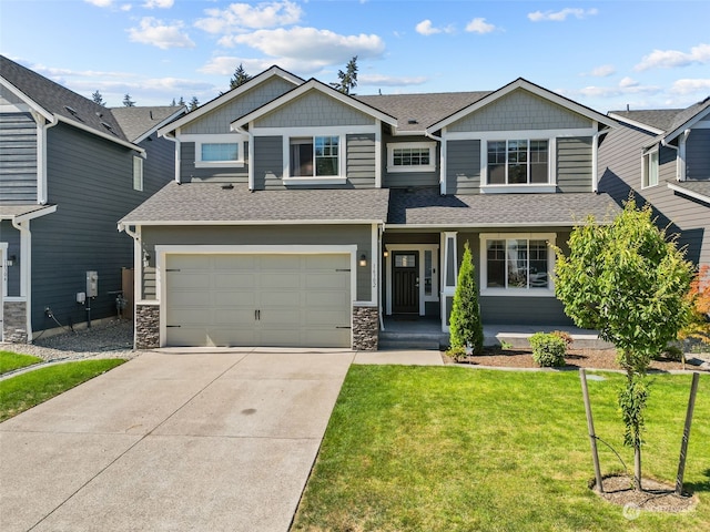 craftsman house with a porch and a front lawn