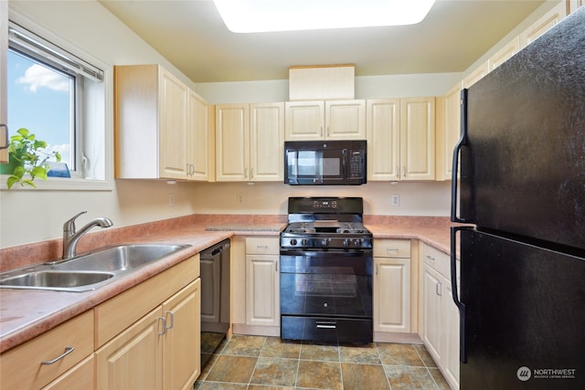 kitchen featuring sink and black appliances