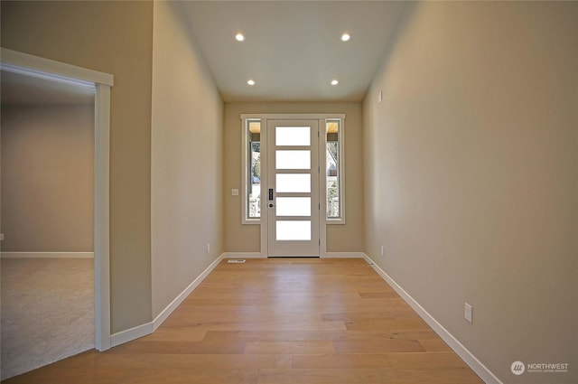 foyer with light wood-type flooring