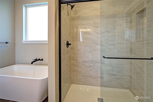 bathroom with independent shower and bath