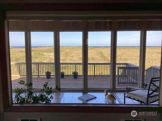 sunroom with a rural view