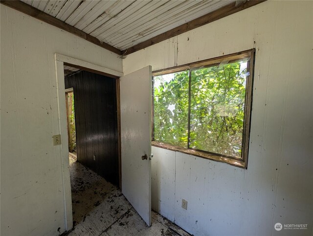 interior space featuring wooden ceiling