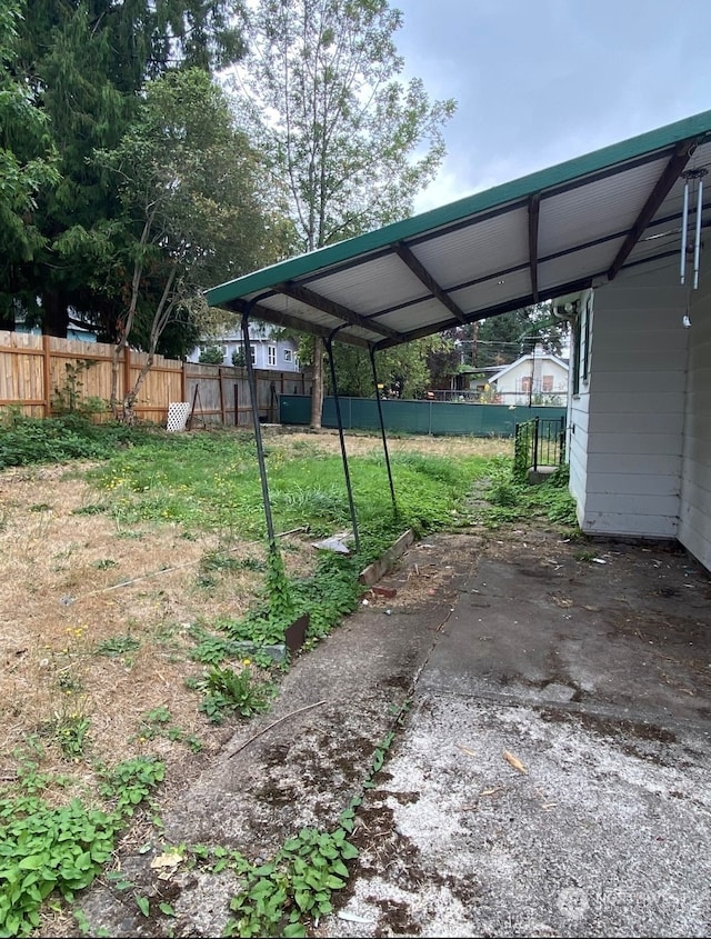 view of parking featuring a carport