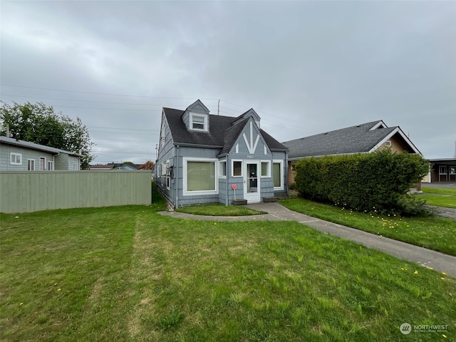 view of front of home with a front yard