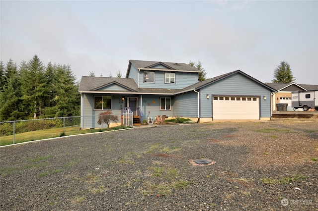 view of front of home with a garage and a porch