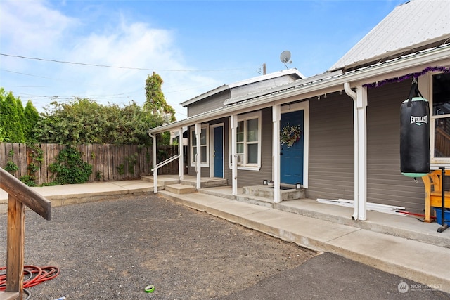 exterior space featuring covered porch