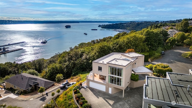 drone / aerial view with a water view