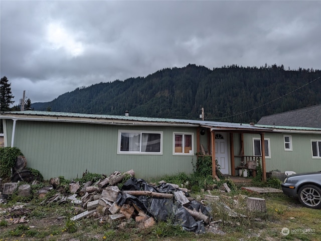 view of front of house with a mountain view