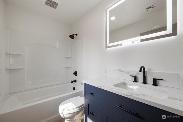 full bathroom with vanity, toilet, and bathtub / shower combination