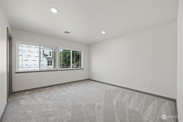 empty room featuring carpet floors