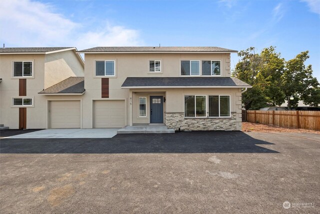 view of front of house with a garage