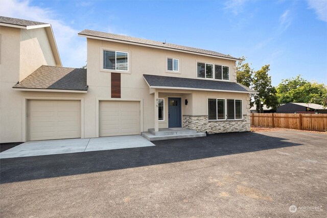 view of front of house with a garage