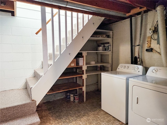 laundry area with washing machine and clothes dryer