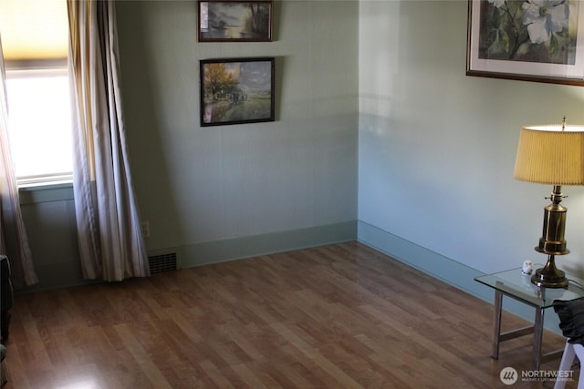 403 S Alder St, Odessa, WA 99159 - unfurnished room with wood finished floors and baseboards