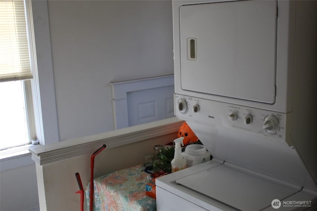 403 S Alder St, Odessa, WA 99159 - clothes washing area with stacked washing machine and dryer