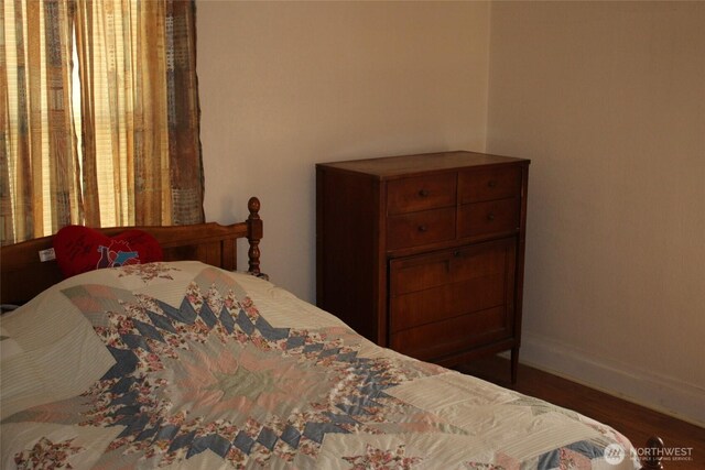 403 S Alder St, Odessa, WA 99159 - bedroom with wood finished floors and baseboards