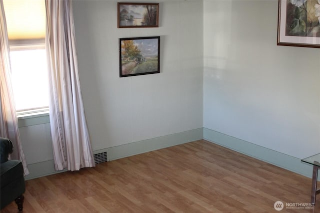 403 S Alder St, Odessa, WA 99159 - empty room with wood finished floors and baseboards