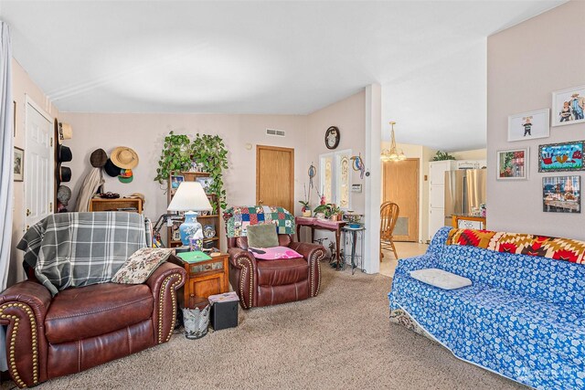 living room with lofted ceiling and carpet