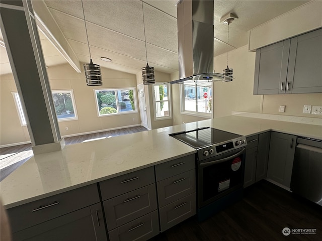 kitchen with dark wood-type flooring, appliances with stainless steel finishes, vaulted ceiling with beams, and island exhaust hood