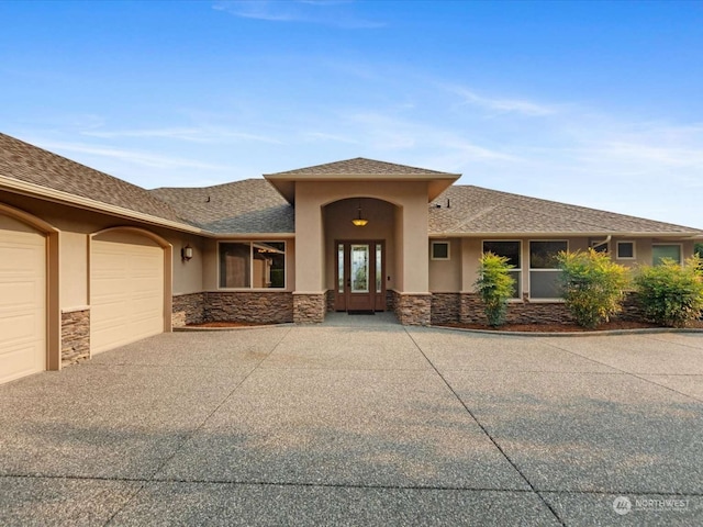 view of front of home with a garage