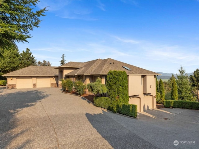 view of front of property with a garage