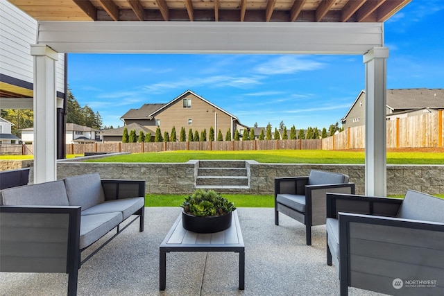 view of patio / terrace featuring outdoor lounge area and fence