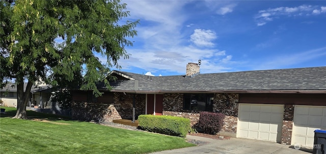 ranch-style home with driveway, a front lawn, an attached garage, brick siding, and a chimney