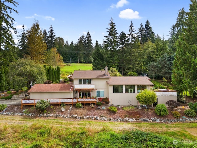 view of front of house with a wooden deck