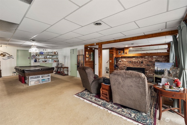 living room featuring carpet flooring, pool table, indoor bar, and a brick fireplace