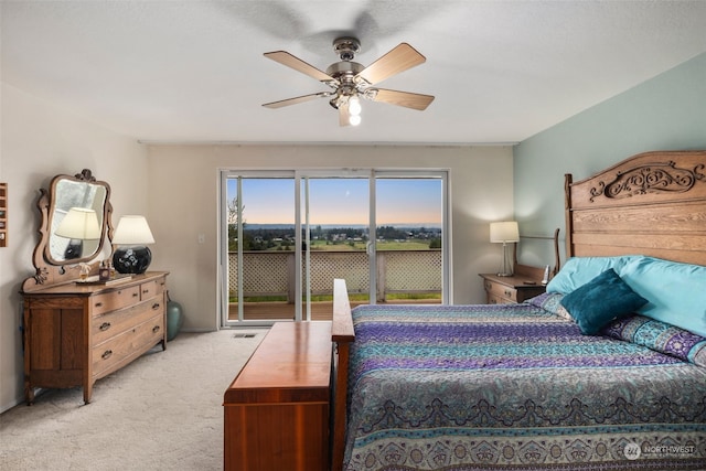 bedroom with light carpet, multiple windows, access to outside, and ceiling fan